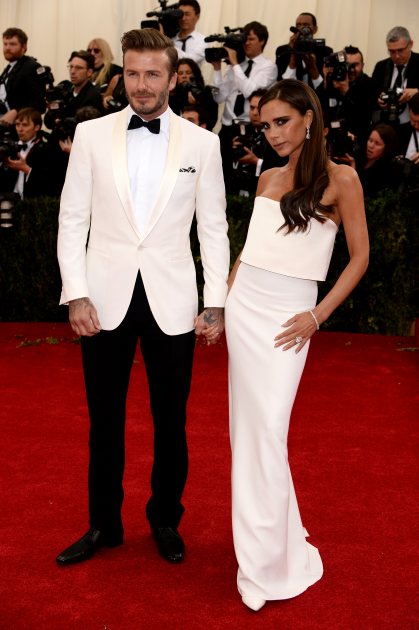 David Beckham & Victoria Beckham arrive to the ‘Charles James: Beyond Fashion’ Costume Institute Gala at the Metropolitan Museum of Art on May 5, 2014 in New York City (Getty)