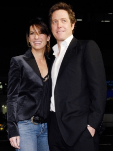 Hugh poses on the red carpet with Sandra Bullock, Feb. 2007