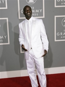 Akon goes all-white for the Grammy red carpet
