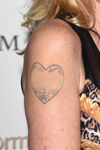 Detail of Melanie Griffith's tattoo at the 60th Taormina Film Fest on June 17, 2014 in Taormina, Italy