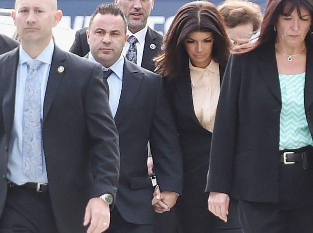 Joe Giudice and Teresa Giudice arrive for sentencing on October 2, 2014 - Getty