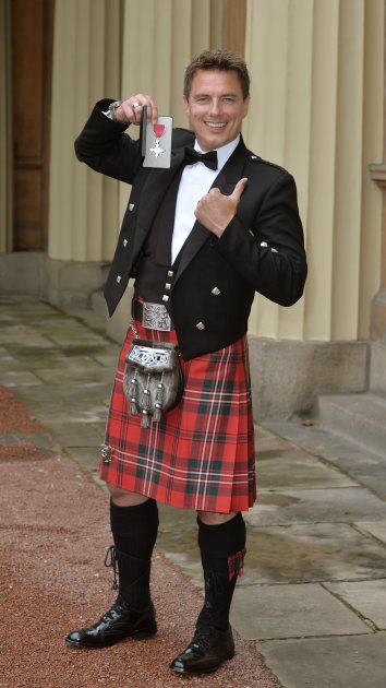 (John Barrowman with his MBE -- Getty Images)