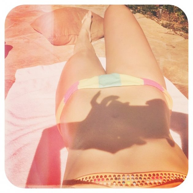 Demi Lovato posted a bikini shot on Instagram on February 27, 2015 with the caption, ‘Regardless of what society tells you these days… You don’t have to have a thigh gap to be beautiful. It is possible to love your body the way it is. #fitness #health #acceptance #selflove’ (Instagram)