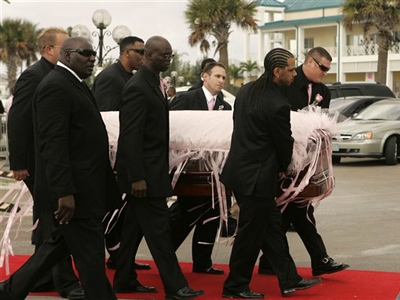 Anna Nicole Smith's body is carried into the church