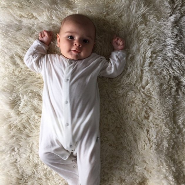 Kourtney Kardashian shared the first full photo of her third baby on April 2, 2015. She captioned the cute pic, ‘My little turtle dove angel baby boy Reign Aston Disick’ (Instagram)