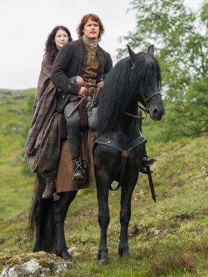 Caitriona Balfe as Claire Fraser and Sam Heughan as Jamie Fraser