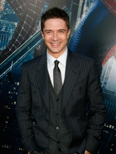 Topher Grace arrives in a stylish suit for the premiere