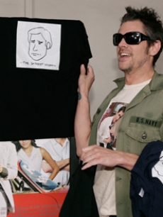 Johnny Knoxville arrives with shirts with Luke's face on them!