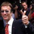 Bee Gee Robin Gibb arrives at a London awards show