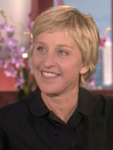 Ellen smiles on the set of her show