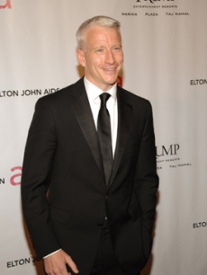 Newsman Anderson Cooper arrives for the AIDS benefit