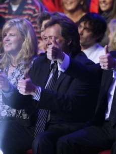 Jimmy and Donny Osmond cheer Marie on