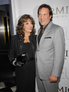 Joan Collins and Percy Gibson arrive for the film premiere