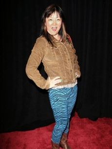 Funny lady Margaret Cho arrives to the exhibit in a wild ensemble