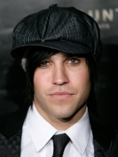 Fall Out Boy bassist smiles for the Hennessy cameras