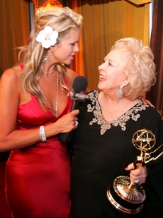 Nancy O'Dell celebrates with Doris Roberts