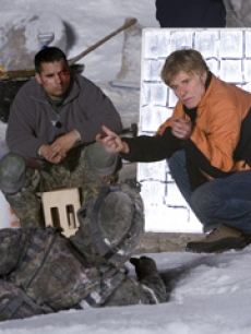 Michael Pena and director Robert Redford on the set 
