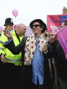 Keith Richards leads a rally against cuts in medical services, London 