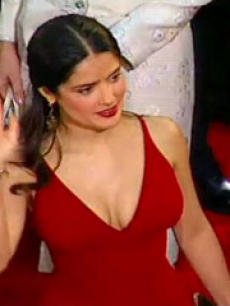 A wave to her fans on the red carpet