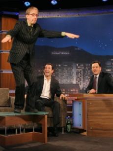 Jimmy Kimmel is entertained by Andy Dick and Helio Castroneves
