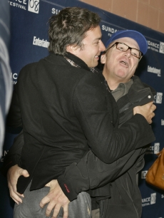 Tom Arnold enthusiastically greets Jimmy Fallon at the premiere of their film 'The Year of Getting to Know Us' at Sundance 