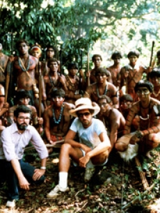 George Lucas and Steven Spielberg pose for a photo with the extras on 'Raiders'