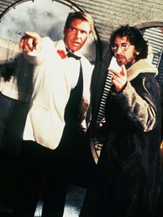 Harrison Ford and director Steven Spielberg discussing a scene 