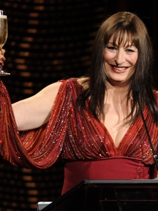 Anjelica Huston toasts the crowd at the close of the 10th Annual Costume 