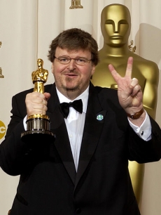 Michael Moore posed backstage with his Oscar in 2003 after giving a 
controversial speech.
