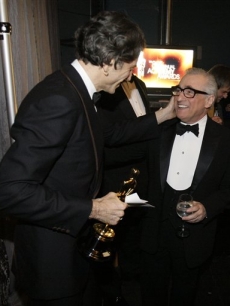 Daniel Day-Lewis gives Martin Scorsese a pat on the cheek