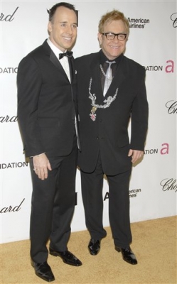 Elton John (right) and his partner David Furnish at Elton's annual Oscar party