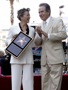 Annette Bening, with husband Warren Beatty by her side, receives her star