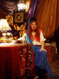 Ellen DeGeneres dons gypsy attire when going undercover as a fortuneteller at Universal Orlando Resort