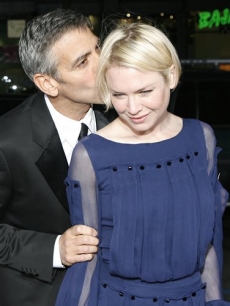 George Clooney kisses actress Renee Zellweger at the premiere of 'Leatherheads' 