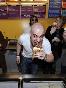 Chris Daughtry takes a bite of ice cream at a ONE Campaign benefit in LA