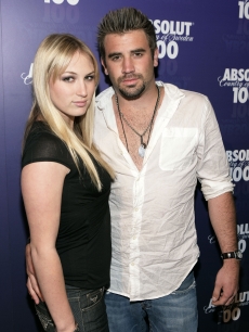 Jason Wahler and Katja Decker-Sadowski pose for pics on the red carpet