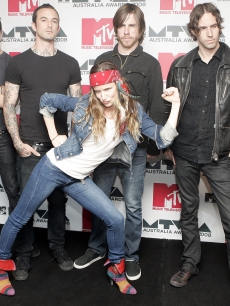 Juliette Lewis and The Licks strike a pose on the NME carpet