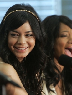 Vanessa Hudgens and Monique Coleman share a laugh during a news conference for ‘HSM 3’