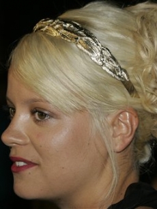 A blonde Lily Allen attends a Cannes film party 
