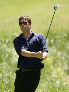 Luke Wilson takes a swing during the third round of the BMW Charity Pro-Am