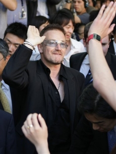 Bono at a ceremony to confer the degree of doctor of laws for Bono at Keio University in Tokyo