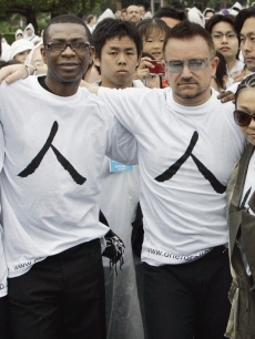 Bono and international musicians at the One for All event in Tokyo
