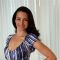 Kristin Davis poses for a photo during a ‘Sex and the City’ junket 