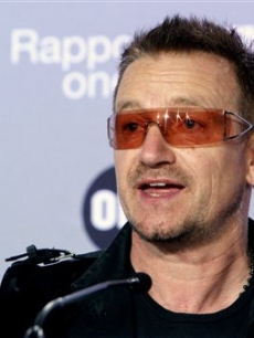 U2 lead singer and activist Bono at a news conference in Paris for aid for Africa