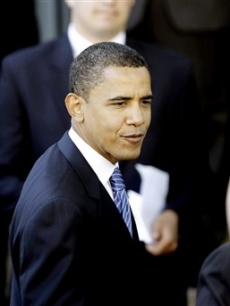 Barack Obama attends the funeral of Tim Russert