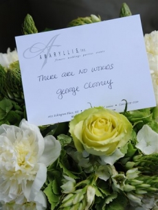 George Clooney sends flowers and a card to Tim Russert’s wake
