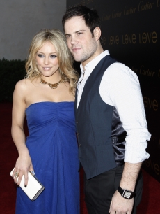 Hilary Duff (in Phillip Lim) and Mike Comrie arrive to the Cartier party