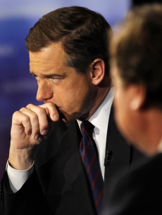 Brian Williams (withTim Russert in the foreground)