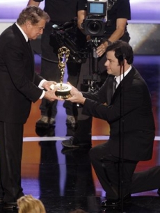 Jimmy Kimmel presents Regis Philbin with the Lifetime Achievement Award at the Daytime Emmys