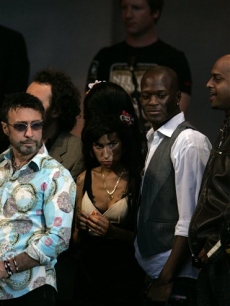 Amy Winehouse appears on stage at Nelson Mandela’s birthday concert